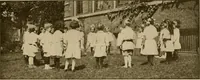 An illustration from Rhythmic action plays and dances; a book of original games and dances, arranged progressively, to Mother Goose and other action songs, with a teaching introductory; for the kindergarten, primary schools, playground and gymnasium (1915)