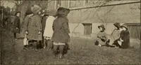 An illustration from Rhythmic action plays and dances; a book of original games and dances, arranged progressively, to Mother Goose and other action songs, with a teaching introductory; for the kindergarten, primary schools, playground and gymnasium (1915)