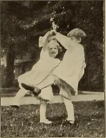 An illustration from Rhythmic action plays and dances; a book of original games and dances, arranged progressively, to Mother Goose and other action songs, with a teaching introductory; for the kindergarten, primary schools, playground and gymnasium (1915)