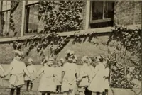 An illustration from Rhythmic action plays and dances; a book of original games and dances, arranged progressively, to Mother Goose and other action songs, with a teaching introductory; for the kindergarten, primary schools, playground and gymnasium (1915)