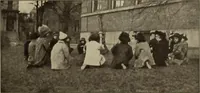An illustration from Rhythmic action plays and dances; a book of original games and dances, arranged progressively, to Mother Goose and other action songs, with a teaching introductory; for the kindergarten, primary schools, playground and gymnasium (1915)