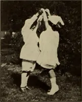 An illustration from Rhythmic action plays and dances; a book of original games and dances, arranged progressively, to Mother Goose and other action songs, with a teaching introductory; for the kindergarten, primary schools, playground and gymnasium (1915)
