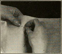 An illustration from School sewing based on home problems (1916)