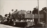 An illustration from Small French buildings; the architecture of town and country, comprising cottages, farmhouses, minor chateaux or manors with their farm groups, small town dwellings, and a few churches (1921)