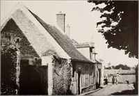 An illustration from Small French buildings; the architecture of town and country, comprising cottages, farmhouses, minor chateaux or manors with their farm groups, small town dwellings, and a few churches (1921)
