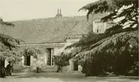 An illustration from Small French buildings; the architecture of town and country, comprising cottages, farmhouses, minor chateaux or manors with their farm groups, small town dwellings, and a few churches (1921)