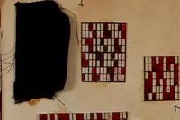 An illustration from [Weaving pattern and sample book (1900)