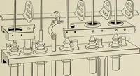 An illustration from The Whitin Machine Works, Whitinsville, Mass. builders of cotton machinery : cards, railway heads, drawing frames, spinning frames, spoolers, wet and dry twisters, reels, long chain quilling machines, looms, etc., etc (1896)